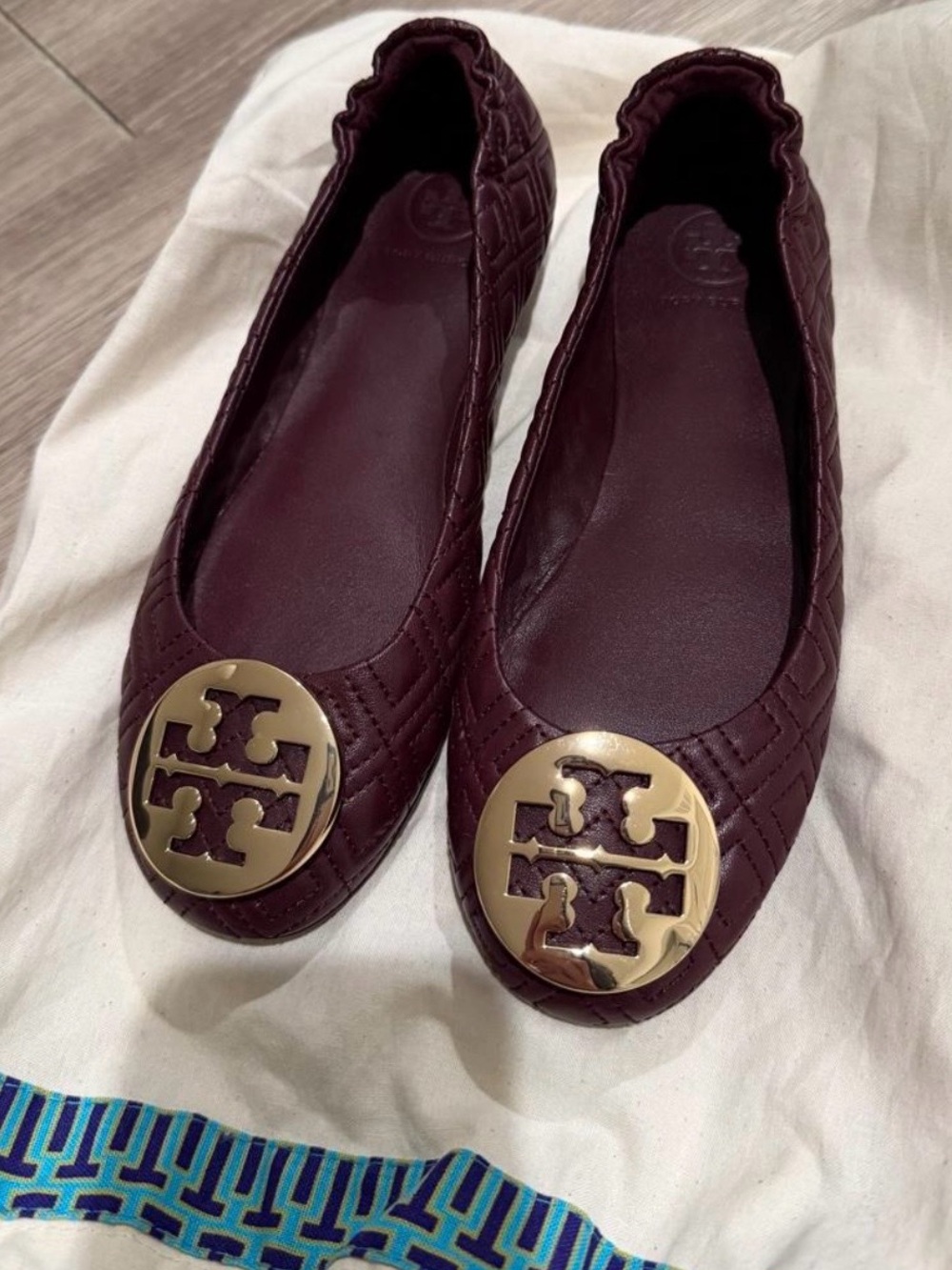 Tory Burch Quilted Ballet Flats in Burgundy with Gold Emblem